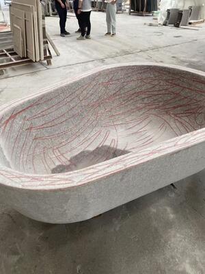 Boormachine voor grafstenen, stenen lantaarns, wasbak.